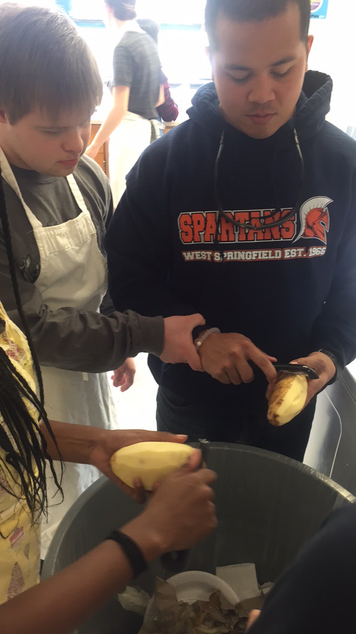 Senior Samuel Schwartz, who is on the left, gets cooking in the Gourmet Foods' kitchen. Next to him is his teacher IA Joe Ibanez.