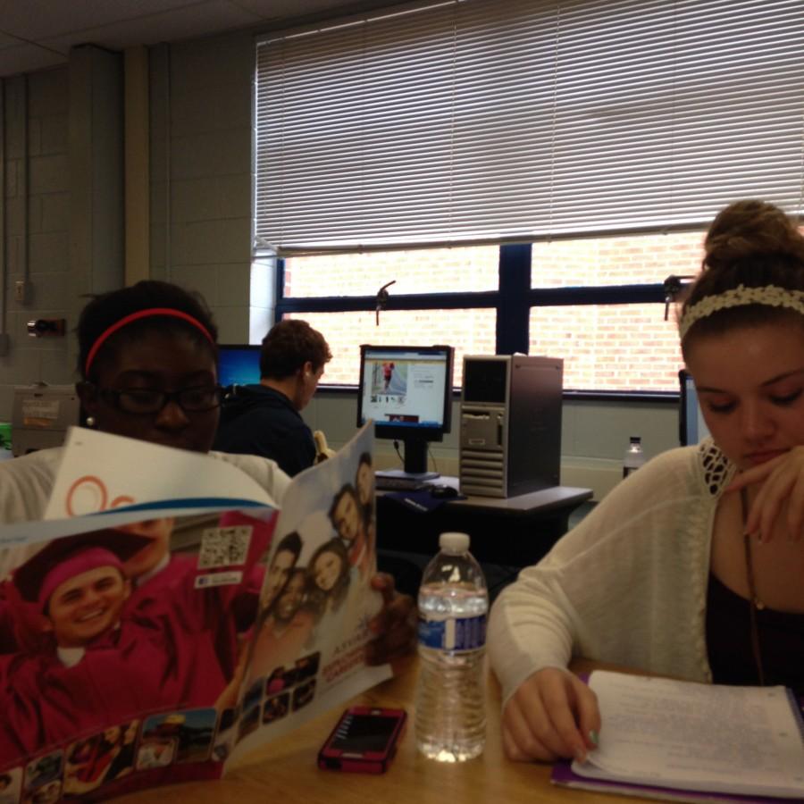Seniors Elsie Cooke and Ashley Baldwin spend their lunch time in the Career Center working on their college essays.