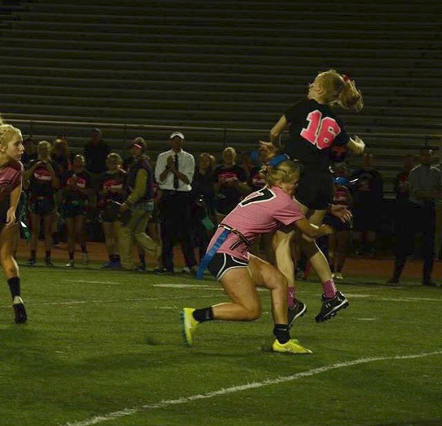 Senior Hailey Blankenship gets destroyed by an underclassman while playing in the Powderpuff game during Homecoming Week. The seniors were beat by juniors, and the sophomores got beat by the freshmen. 