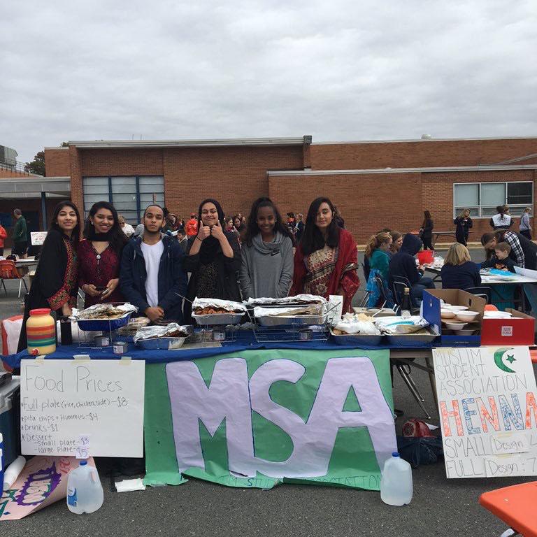 Muslim Student Association (MSA) members  raise money  during SpartanFest for service projects and charity.