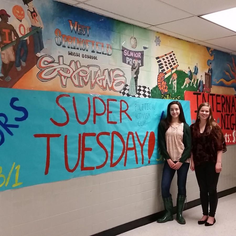 The President of the Political Activism Club, senior Sarah Carter, and its Vice President, freshman Jacqueline Torres, stand by one of the club’s signs.  