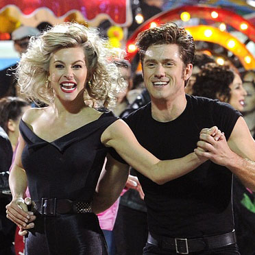 Aaron Tevit and Julianne Hough portray the characters of Danny Zuko and Sandy Olsson as they conclude the production with the musical number, “We Go Together.”
