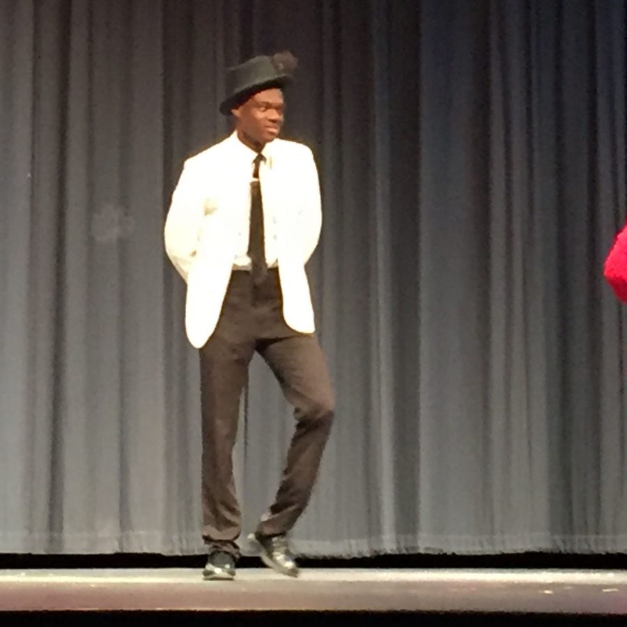 junior Daniel Adu   shows off his moves in the dance to “My Girl” by The Temptations, one of the most popular groups of black musicians of the 20th Century.