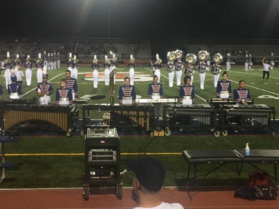 The WS marching band performs during a home football game