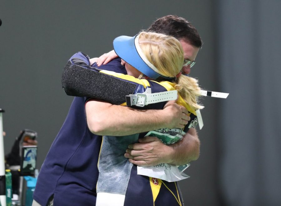 2015 alum Ginny Thrasher celebrates winning the first gold medal of the Rio Olympics with a hug. Thrasher is one of two WS alumni to have competed at the Olympics this past summer.