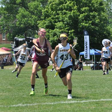 Freshman Alyssa Maryanopolis on the field during one of her many lacrosse games for her club team. She also is the starting goalie for the varsity WS field hockey team.
