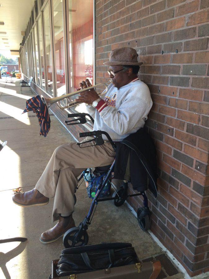 Jonnie Jonson, the Springfield trumpet man, sits outside Cardinal Forest Plaza playing tunes for all the people to enjoy when walking by him on a nice fall day. After years of practice and hard work, he is finally doing what he loves.