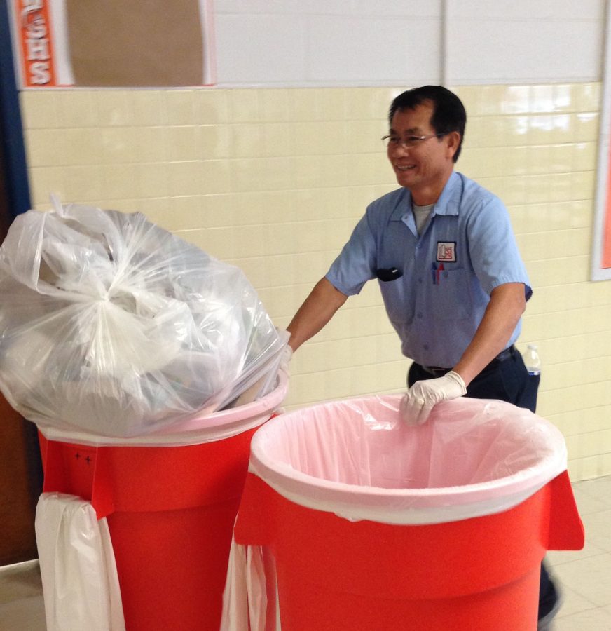 As+pictured+above%2C+custodian+Tom+Thamvongsa+cleans+up%0Athe+cafeteria+with+a+positive+attitude.