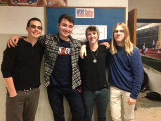 The members of Strung-Out pose together for a group picture. Seniors Cole Krieger on the far left; Dale Guernsey on the far right; Joe Kriebel in between to the left; and Logan in between to the right.