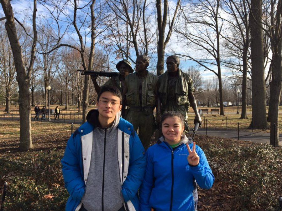 Stefanie Takenaka flashes a peace sign wither her Japanese exchange student, Leo Muramatsu, when she took Muramatsu downtown to explore in Washington, DC.