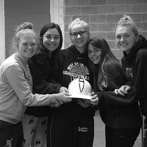 The WS girl’s lacrosse low defense after a game against Chantilly High School getting the hard hat award that symbolizes working hard and being the backbone of the team that game. 