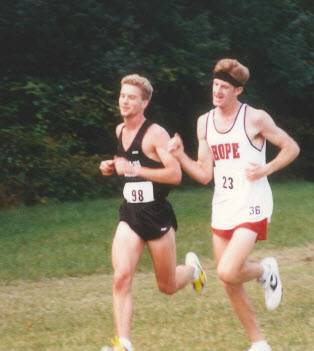 A young Brian Heintz (left) running energetically in the early 1990s for Kalamazoo
