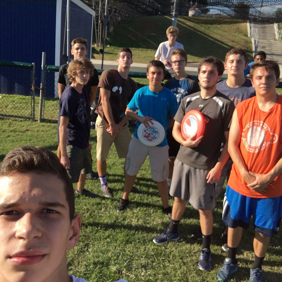 The+WS+frisbee+club+takes+a+break+from+one+of+their+meetings+consisting+of+running+around+and+throwing+frisbrees+to+each+other.+The+club+meets+Wednesdays+and+Fridays+on+the+football+field+and+anyone+is+open+to+join.