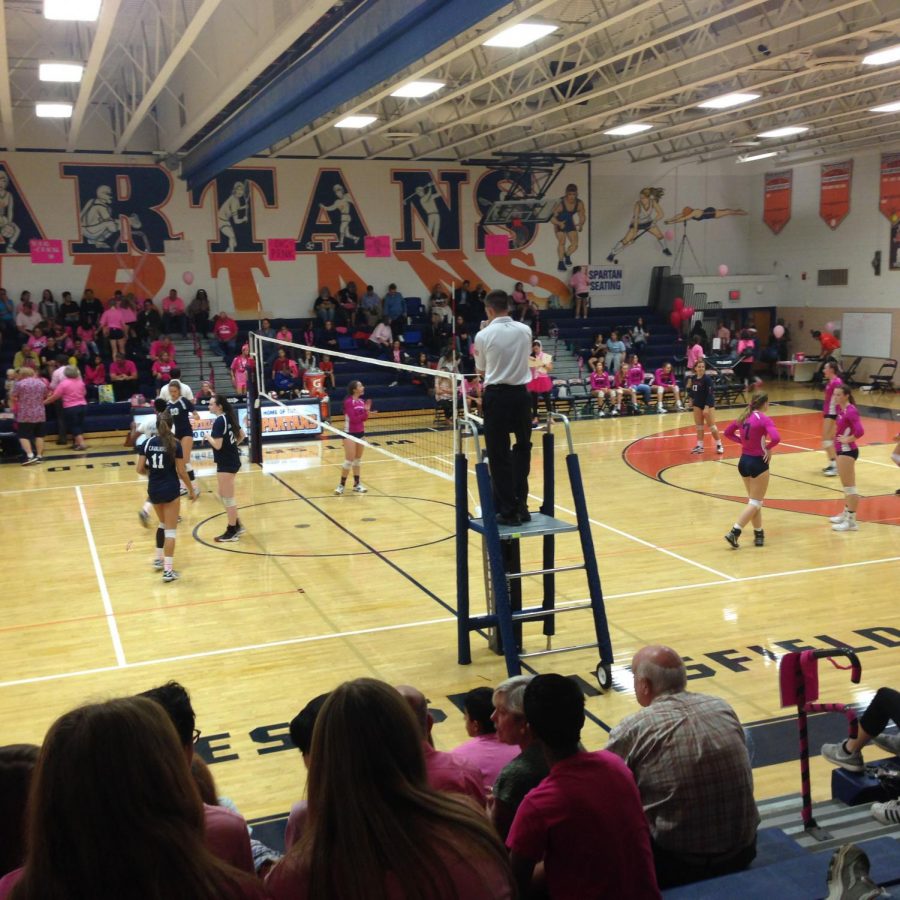 Varsity volleyball plays their annual Dig Pink game. 