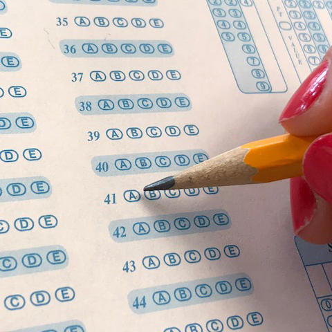 The obsessive secrecy and financial opportunism surrounding tests such as AP exams and SATs often prevent students from receiving feedback that allows them to learn from their mistakes.