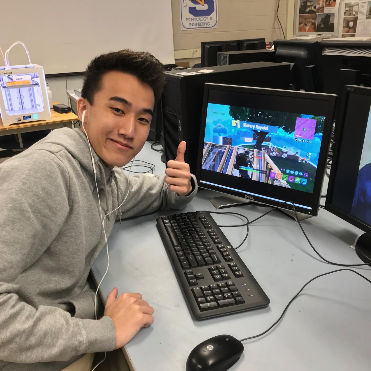 Senior Ivan Kang is one of many boys who play and are easily distracted by Fortnite - even in class. The girls just don't get it.