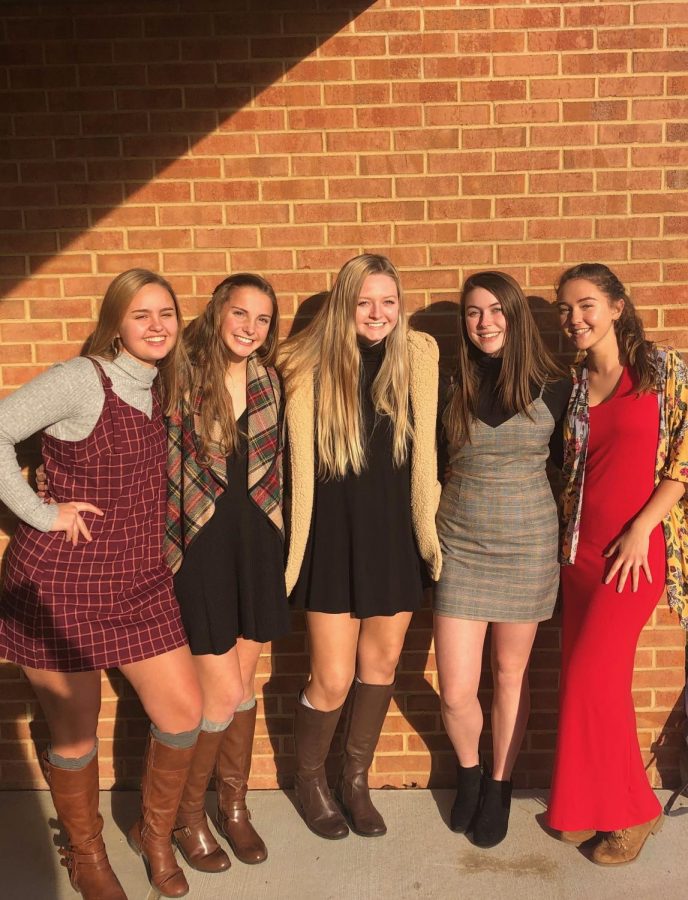 Juniors Lauren Bashan, Becca Giles, Caroline Guge, Elsa Iannotta, and Maeve Hennessy pose outside of WSHS in order to demonstrate their determination to bring change on human trafficking by participating in Dressember this year.