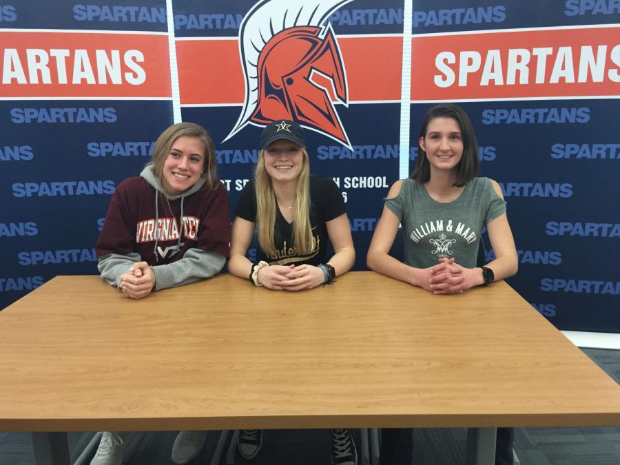 From left to right, seniors Chase Kappeler, Sarah Coleman, and Hope Stephens pose for a picture on their signing day. All three are to run: Kappeler at Virginia Tech, Coleman at Vanderbilt, and Stephens at William and Mary.