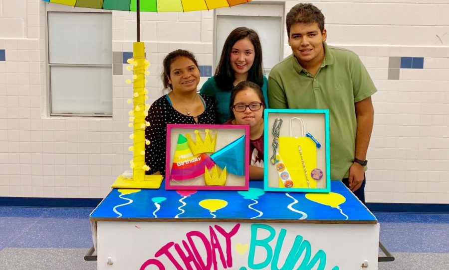 Senior Kayla Rothstein with Buddies Club members Ariana Orellana, Elaine Yepez, and Jesse Buruca. The birthday cart will be selling birthday goodies that students can buy and send to their friends on their birthdays. If their birthday falls on a weekend, the goods will be distributed on a Friday or Monday.