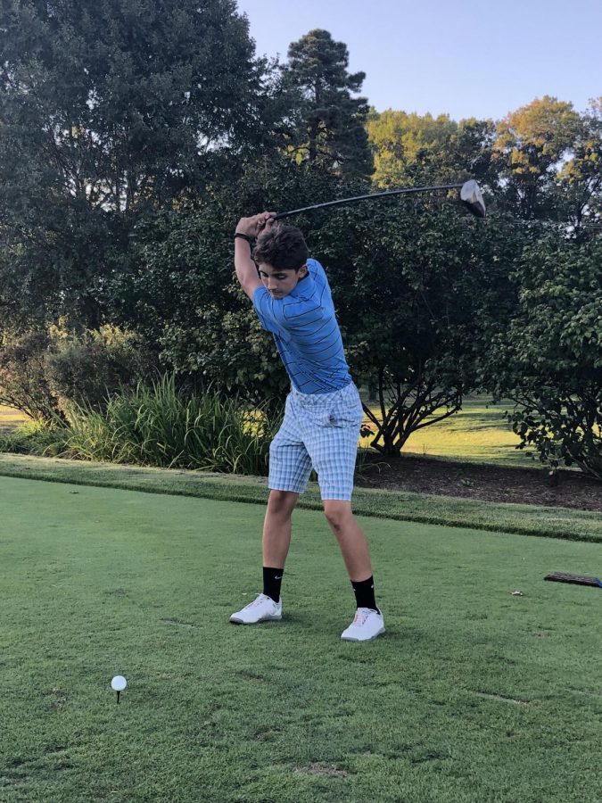 Junior Peter Montavon tees off during practice at Springfield Country Club. The Spartans are preparing for their postseason run after a strong regular season.
