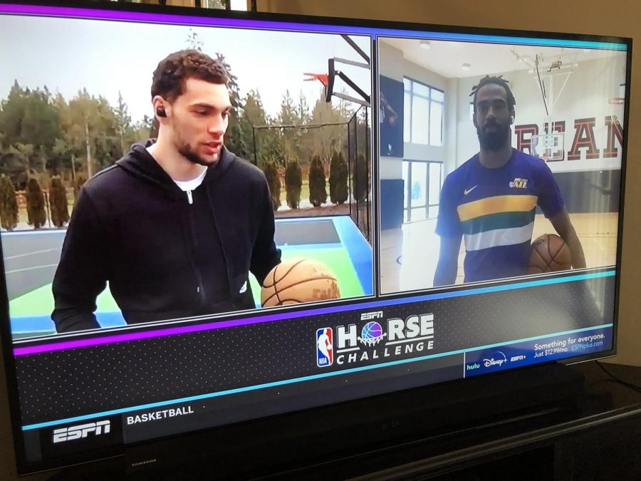 A view of the split TV screen on ESPN as Chicago Bulls forward Zach Lavine explains his next shot in the final round against Utah Jazz guard Mike Conley. Conley would go on to win the competition despite Lavine’s use of controversial near-dunks throughout the event.