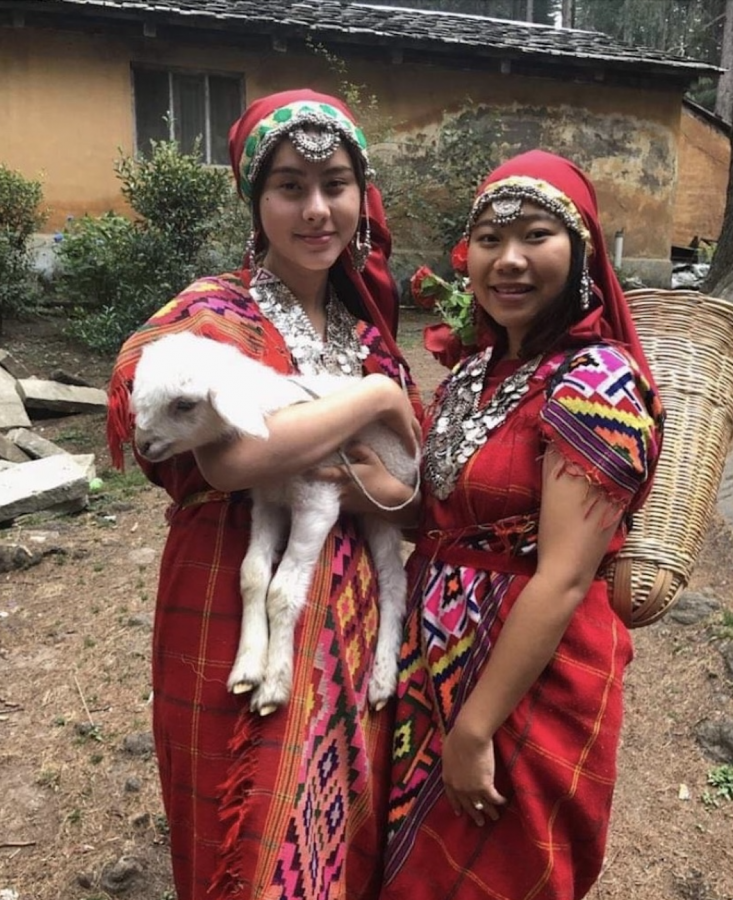 Sophomore Tenzin Werner and her sister celebrate the Buddhist holiday, Bodhi Day, together while wearing the traditional clothing of the Kinnaur tribe in Himachal Pradesh, India.