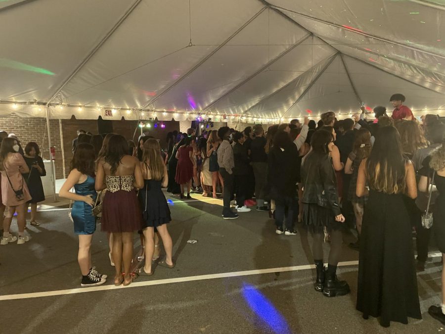 Students standing around at the 2021 outdoor Homecoming dance. The event was held in the school parking lot due to COVID-19 restrictions, which resulted in a far more lackluster experience than previous years.