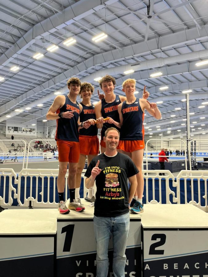 Due to a bet conceived at the very beginning of the Indoor Track season, largely inspired by Head Track and Field Coach Chris Pellegrini’s occasional visits to Arby’s following meets, he was obligated to wear the restaurant’s shirt for their podium picture.