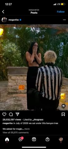 MGK kneels on one knee under the banyan tree at the Ritz-Carlton’s Spa Botánico in Dorado Beach, Puerto Rico. It is below these branches that the two claimed to have fallen in love; the tree also serves as the inspiration for “banyan tree (interlude)” on MGK’s latest album.