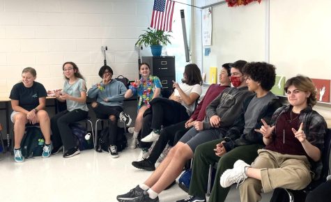 Heather Kendrick teaches her American Sign Language 2 class during fifth period. Her classroom is arranged so the chairs and tables surround the edges. This orientation is so everyone can easily watch others sign and communicate effectively.