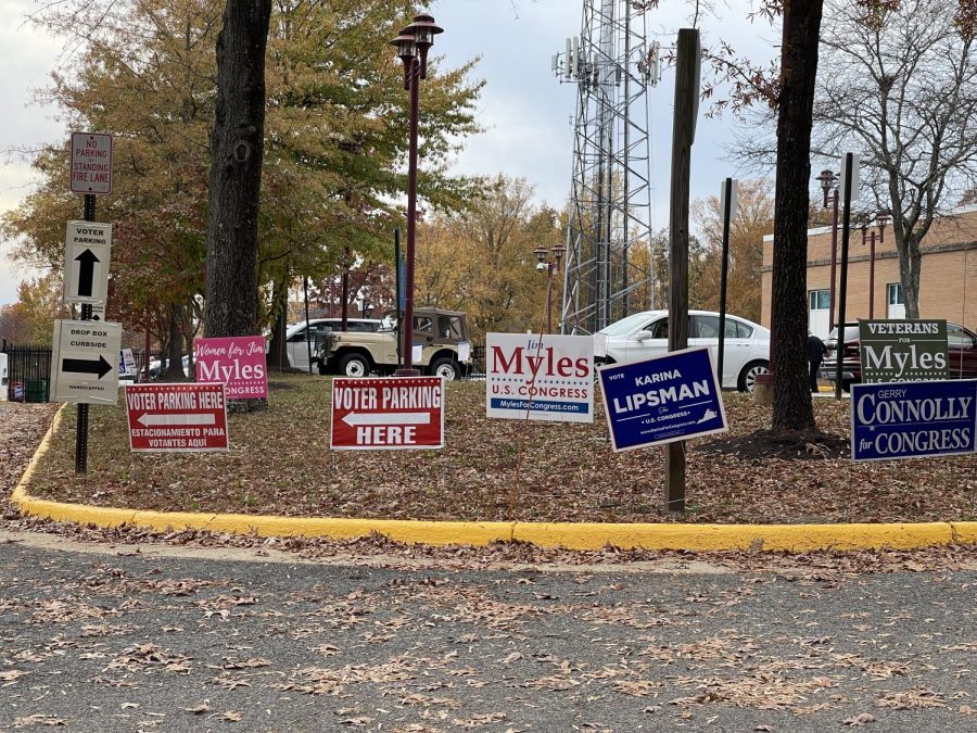 Polling places, like this one just down the street from WS, will be littered with campaign signs and tents with both republican and democrat sample ballots.
