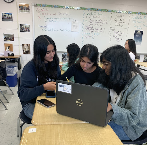 SASA officers (left to right) Hiba Khalid, Ishi Velpula, and Sarayu Jilludumudi begin planning for their first club meeting.