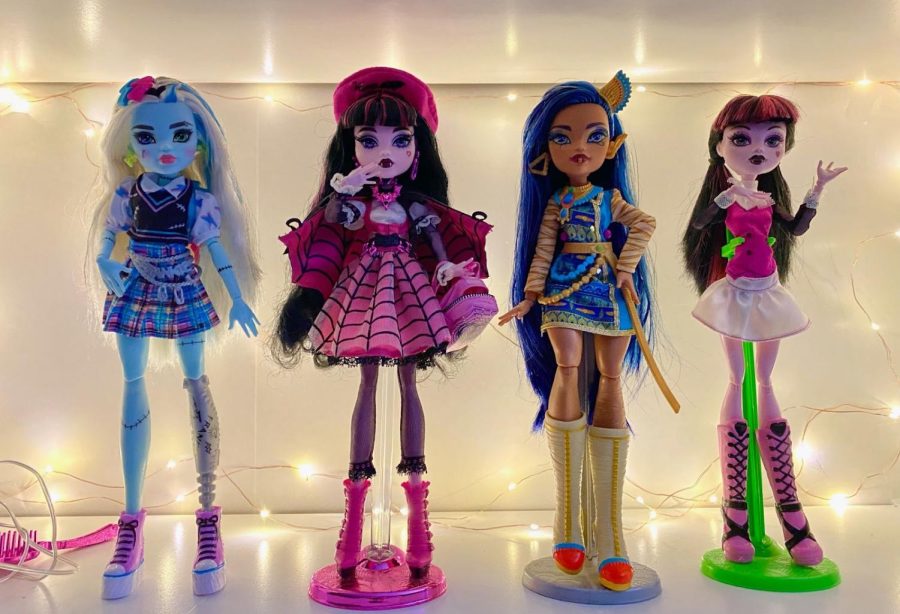 From left to right: generation three Frankie Stein, Haunt Couture collector’s Draculaura, generation three Cleo de Nile, and generation one Creeproductions Draculaura. Frankie and Cleo have different body molds from earlier dolls, with Frankie getting a taller doll and Cleo getting a curvier body type. Mattel made the decision to change the body types of their dolls in hopes of representing and appealing to a wider audience.