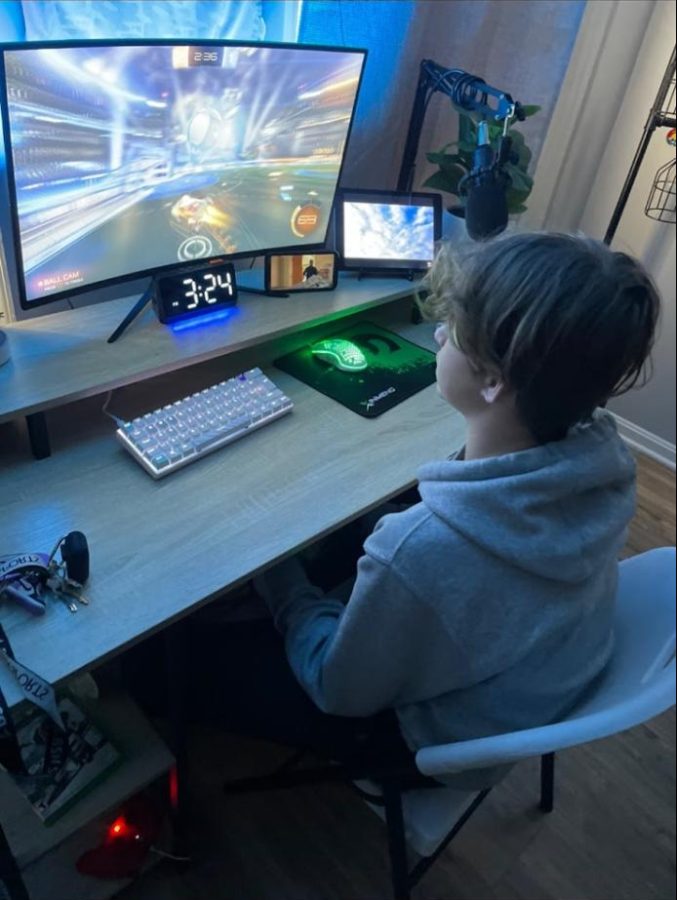 Coan Barnett, eighth grader at Irving Middle School, playing ESports late at night.