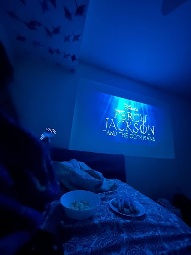 Senior Anika Pant and her friend watch the two-episode premiere of “Percy Jackson and the Olympians” on Disney+. They also enjoyed blue lemon cookies and blue chocolate pretzels, as Percy Jackson has a special love for blue food.