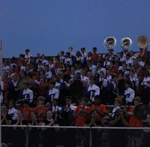 The WSHS Marching Band, a staple of Friday night football games, faces an uncertain future as federal funding cuts threaten surrounding programs.