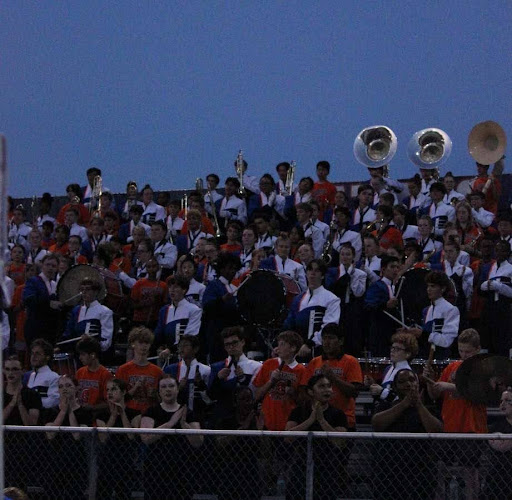 The WSHS Marching Band, a staple of Friday night football games, faces an uncertain future as federal funding cuts threaten surrounding programs.