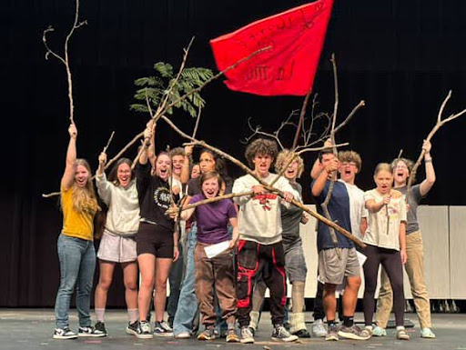 Students in Spartan Theatre rehearse a high-energy battle scene for Macbeth, raising branches as makeshift weapons while bringing the intensity of Shakespeare’s tragedy to life on stage.