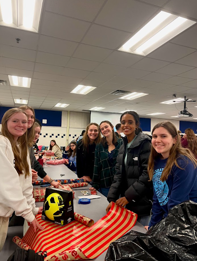 On Dec. 16, the monthly NHS meeting was dedicated to members wrapping all the donated items. 