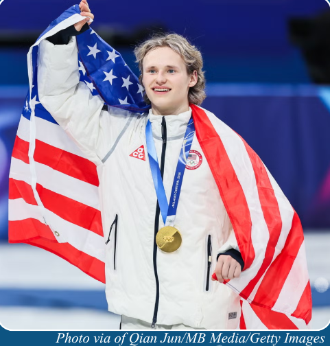 Ilia Malanin, a Fairfax County graduate, at the Gold Medal Ceremony for Team Figure Skating